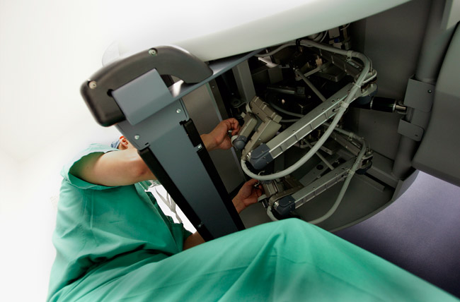 Dr. David Lee using Robotics surgery machine